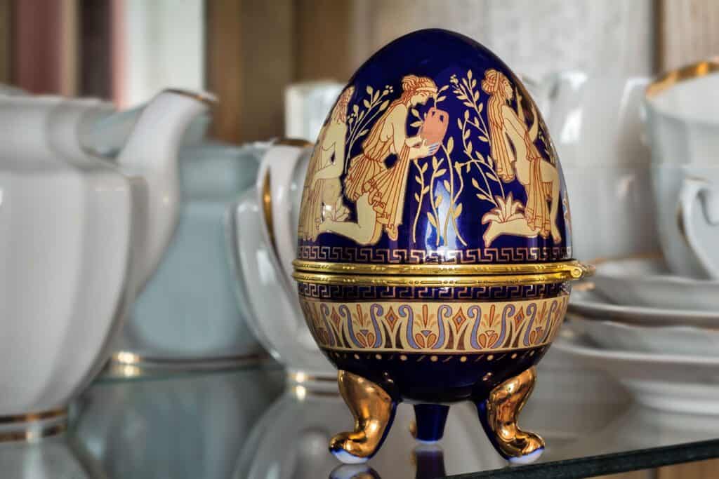 A closeup of an Easter egg-shaped casket