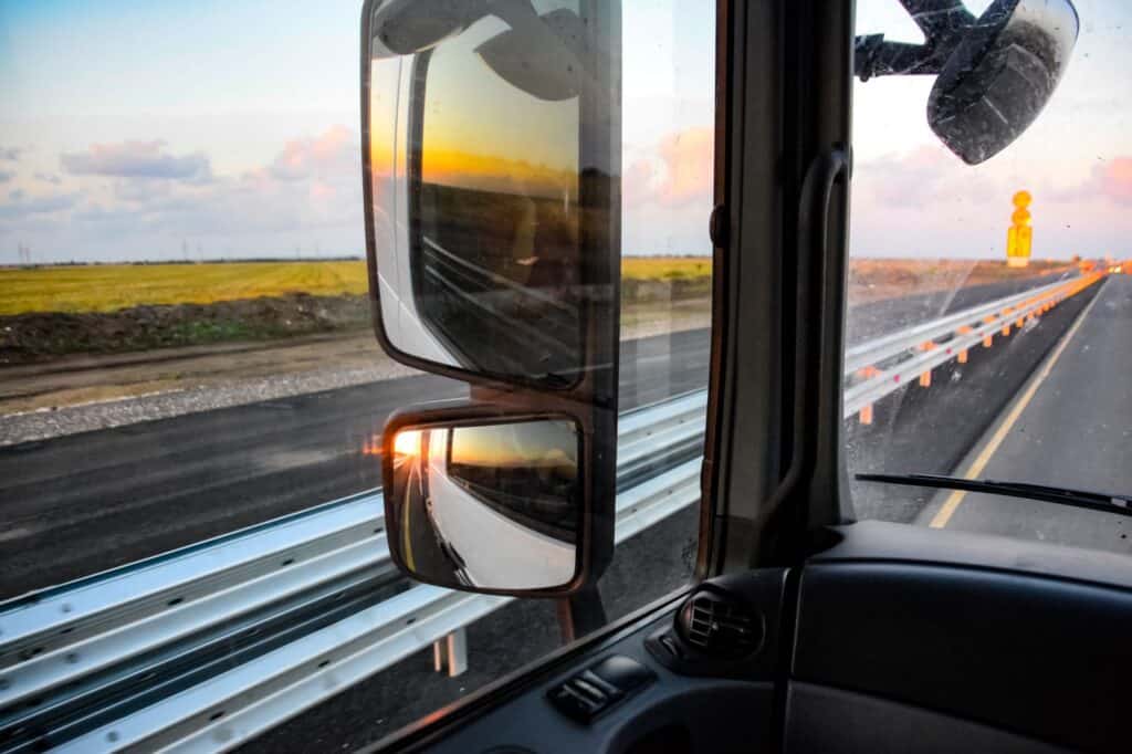 The view of the road from inside the truck on a moving day