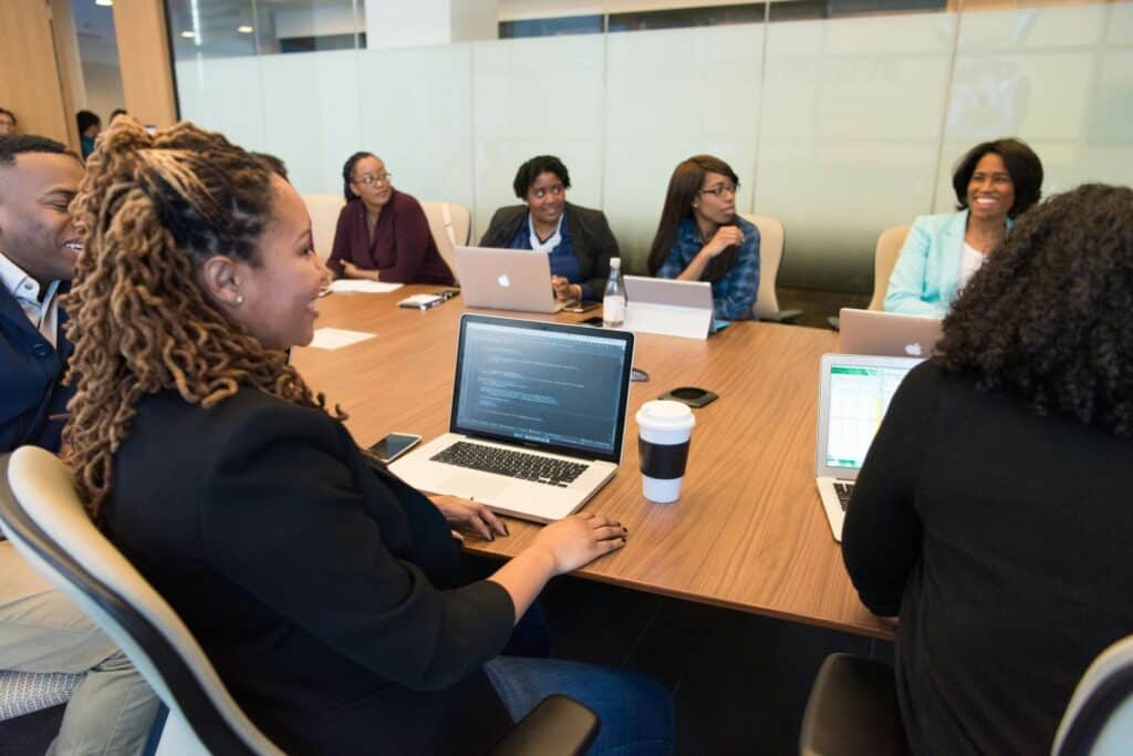 The employees in a meeting room