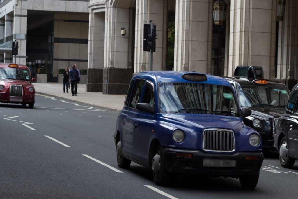 Multiple 'Hackney Carriages' on the road